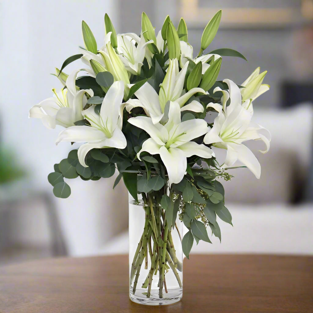 Ivory Haven™ – 10 Oriental Lilies & Eucalyptus Vase